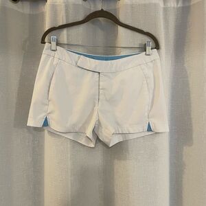 Vintage Nike Women’s White Athletic Shorts with Light Blue Trim